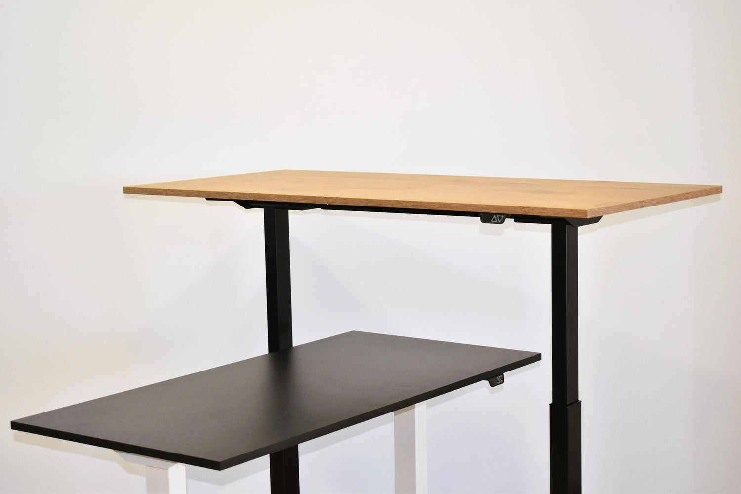 Two height adjustable desks